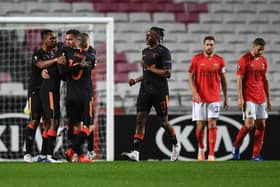 Steven Davis joins the celebrations after Glen Kamara had scored Rangers' second goal in their thrilling 3-3 draw against Benfica in Lisbon on Thursday evening. (Photo by PATRICIA DE MELO MOREIRA/AFP via Getty Images)