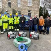 Engineers from SSEN Transmission's Kintore Substation project donated the pumps to the Kintore Resilience Group.
