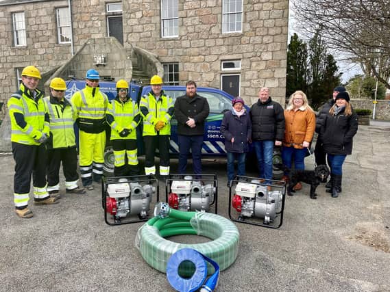 Engineers from SSEN Transmission's Kintore Substation project donated the pumps to the Kintore Resilience Group.