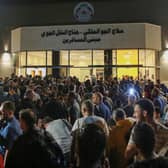 People evacuated from Sudan arrive at a military airport in Amman. Foreign Secretary James Cleverly has said the UK is contacting British nationals directly with routes for an evacuation out of Sudan.

 (Photo by KHALIL MAZRAAWI/AFP via Getty Images)