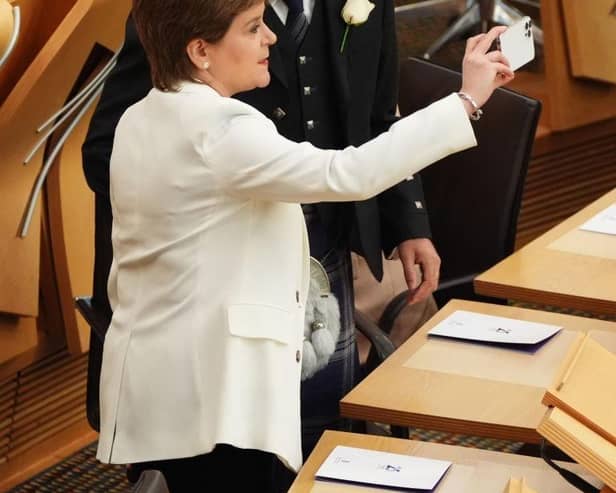 Former First Ministers Nicola Sturgeon and Humza Yousaf both have companies to channel their extra-curricular payments (Picture: Andrew Milligan/Pool/Getty Images)