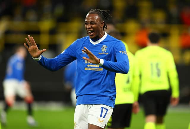 Joe Aribo celebrates after Rangers scored their second goal in the 4-2 win over Borussia Dortmund in Germany on February 17. (Photo by Martin Rose/Getty Images)