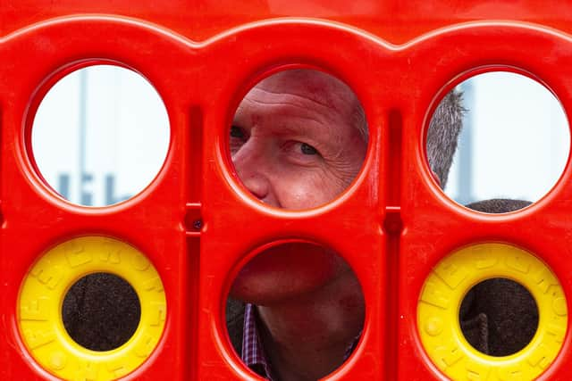 Scottish Liberal Democrat Leader Willie Rennie announces plans for mental health first aiders by playing a giant game of Connect 4. Picture: Lisa Ferguson