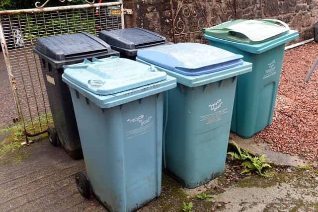 Wrong: Western Isles council is demanding wheelie bins should be presented with handles facing outwards