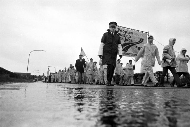 Police walk alongside the Peoples March for Jobs in the Borders in April 1983