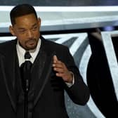 Will Smith cries as he accepts the award for best performance by an actor in a leading role for "King Richard" at the Oscars on Sunday, March 27, 2022, at the Dolby Theatre in Los Angeles. (AP Photo/Chris Pizzello)