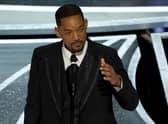 Will Smith cries as he accepts the award for best performance by an actor in a leading role for "King Richard" at the Oscars on Sunday, March 27, 2022, at the Dolby Theatre in Los Angeles. (AP Photo/Chris Pizzello)