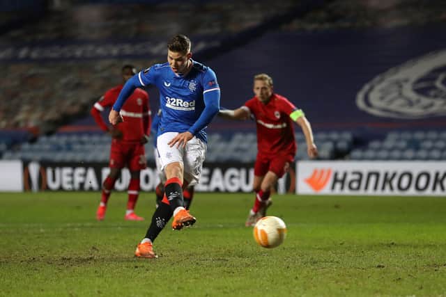 Cedric Itten of Rangers scores his sides 5th goal from the penalty spot during the UEFA Europa League Round of 32 match between Rangers FC and Royal Antwerp FC at Ibrox Stadium  on February 25, 2021 in Glasgow, Scotland.  (Photo by Ian MacNicol/Getty Images)