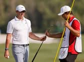 Rory McIlroy hands his putter to caddie Harry Diamond during the final day of the WGC-Dell Technologies Match Play at Austin Country Club in Texas. Picture: Mike Mulholland/Getty Images.