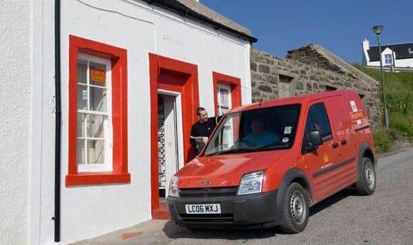 Mr Redman outside the post office on Islay before it was sold.