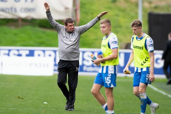 Kilmarnock manager Tommy Wright acknowledges the away support after the cinch Championship match between Partick Thistle and Kilmarnock at Firhill on September 18, 2021, in Glasgow, Scotland.  (Photo by Sammy Turner / SNS Group)