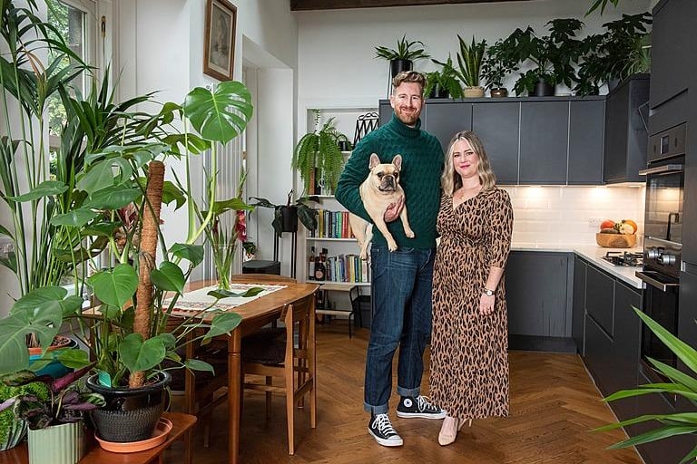 Ben, Christina and their dog Watson at home in the Old Train House, in Edinburgh.