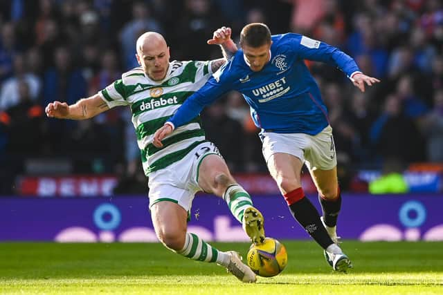 Celtic's Aaron Mooy (L) and Rangers' John Lundstram in action during the Viaplay Cup final at Hampden last month.  (Photo by Paul Devlin / SNS Group)