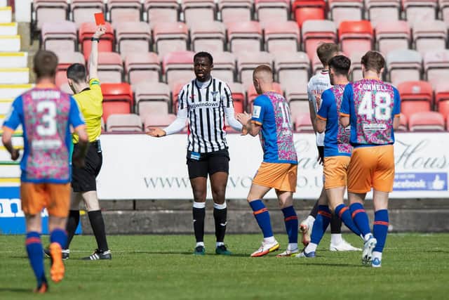 Dunfermline's Efe Ambrose is shown a straight red card in the Championship play-off semi-final 2nd leg against Queen's Park at East End Park. (Photo by Sammy Turner / SNS Group)