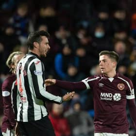 St Mirren's Joe Shaughnessy (L) is sent off by referee Alan Muir. (Photo by Ross Parker / SNS Group)