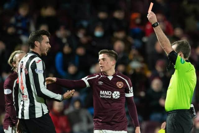 St Mirren's Joe Shaughnessy (L) is sent off by referee Alan Muir. (Photo by Ross Parker / SNS Group)