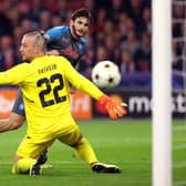 Khvicha Kvaratskhelia of SSC Napoli scores their team's fifth goal past Remko Pasveer of Ajax during the UEFA Champions League group A match between AFC Ajax and SSC Napoli at Johan Cruyff Arena.