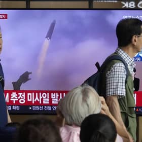 A TV screen shows a file image of North Korea's missile launch during a news program at the Seoul Railway Station in Seoul, South Korea. Picture: AP Photo/Ahn Young-joon