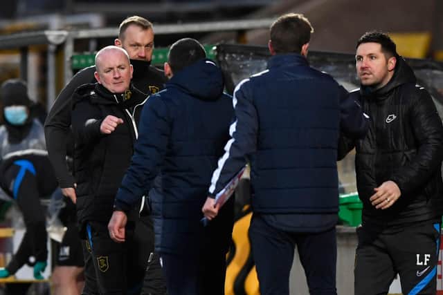 Livingston manager David Martindale (L) congratulates St Johnstone counterpart Callum Davidson after seeing his side lose for the first time under his charge (Photo by Sammy Turner / SNS Group)
