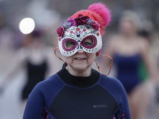 A swimmer takes part in a sunrise dip at Portobello to mark International Women’s Day. Photo: Jeff J Mitchell/Getty Images