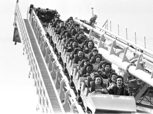 Locals enjoying the Coca-Cola roller coaster at a special preview of the Glasgow Garden Festival in April 1988.
