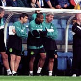 Terry McDermott watches the 1999 fixture with Kilmarnock with Eric Black and Celtic head coach John Barnes (3rd left)