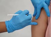 A person receiving a Covid-19 jab, as confidence in vaccines has declined "significantly" since the start of the pandemic, according to a new study. Picture: Kirsty O'Connor/PA Wire