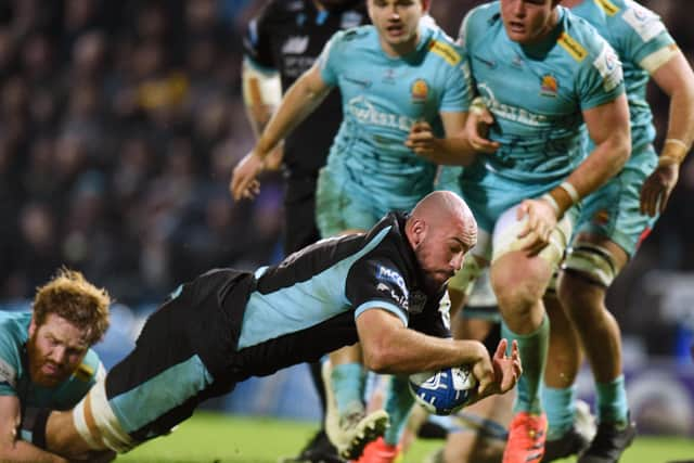 Kiran McDonald crashes over for a first half try for Glasgow against Exeter Chiefs. Photo: David Gibson/Fotosport/Shutterstock