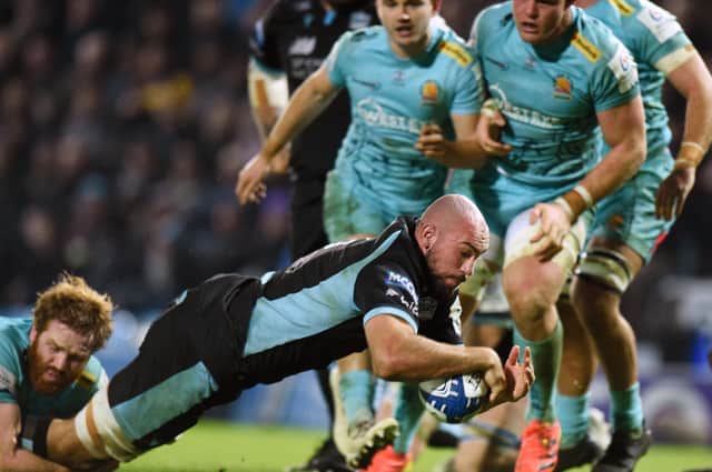 Kiran McDonald crashes over for a first half try for Glasgow against Exeter Chiefs. Photo: David Gibson/Fotosport/Shutterstock
