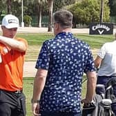 David Burns, who is attending his first DP World Tour event since last May, chats to Calum Hill on the Emirates Golf Club range in the build up to the Hero Dubai Desert Classic. Picture: National World