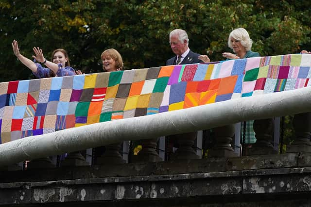 The Prince of Wales and the Duchess of Cornwall, known as the Duke and Duchess of Rothesay when in Scotland, unveil a knitted art installation during a visit to Dumfries House in Ayrshire.