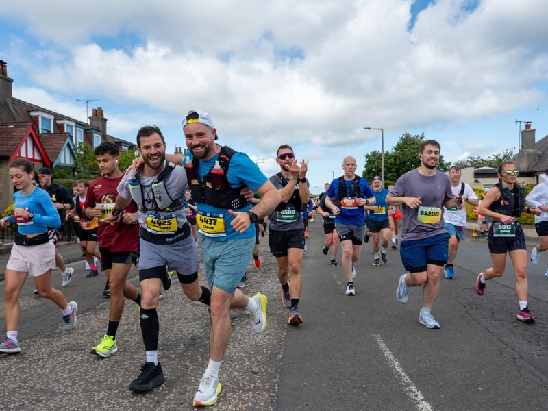 Edinburgh Marathon runners at the four mile mark in the Craigentinny area of the City