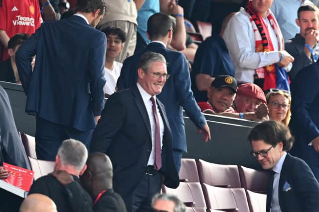 Sir Keir Starmer, Leader of the Opposition and Leader of the Labour Party, looks on as he takes his seat prior to Manchester United v Arsenal earlier this month.