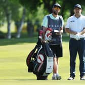 Richie Ramsay mulls over a shot with caddie Scott Carmichael during the Volvo Car Scandinavian Mixed at Ullna Golf & Country Club in Sweden. Picture: Matthew Lewis/Getty Images.