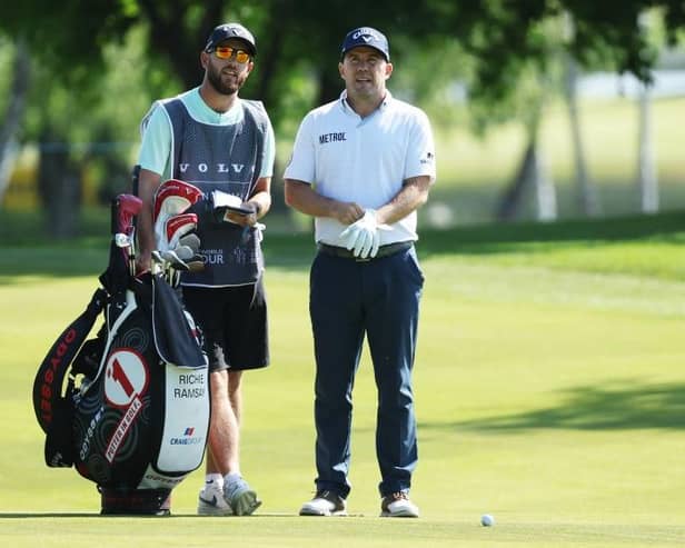 Richie Ramsay mulls over a shot with caddie Scott Carmichael during the Volvo Car Scandinavian Mixed at Ullna Golf & Country Club in Sweden. Picture: Matthew Lewis/Getty Images.