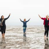 Nerea Bello, Julia Taudevin and Mairi Morrison are ill involved in the Fringe show Move, which is being staged on Silverknowes Beach this week. Picture: Lisa Ferguson