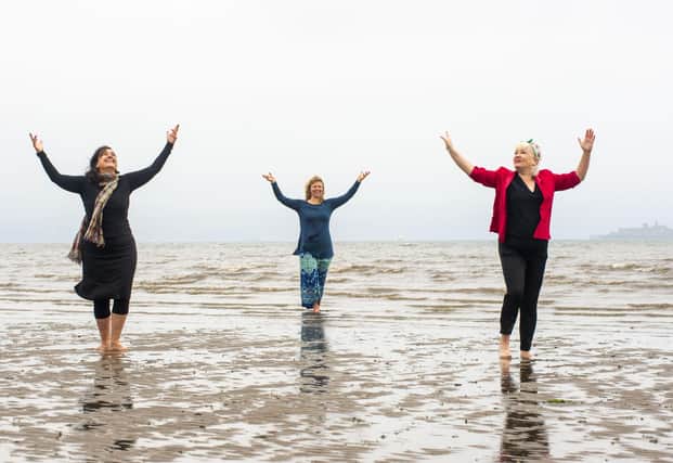 Nerea Bello, Julia Taudevin and Mairi Morrison are ill involved in the Fringe show Move, which is being staged on Silverknowes Beach this week. Picture: Lisa Ferguson