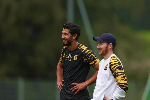 Ian Cathro with former Premier League player Ahmed Hegazy at Al-Ittihad.