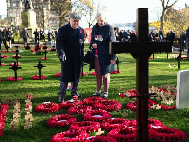 Members of the public attend the service of Remembrance to commemorate Armistice Day at the Scott Monument in Edinburgh (Picture: Jeff J Mitchell/Getty Images)