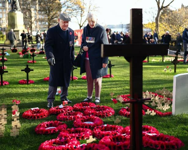Members of the public attend the service of Remembrance to commemorate Armistice Day at the Scott Monument in Edinburgh (Picture: Jeff J Mitchell/Getty Images)