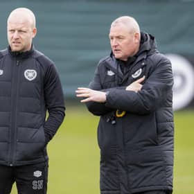 Steven Naismith and Frankie McAvoy oversee a Hearts training session.