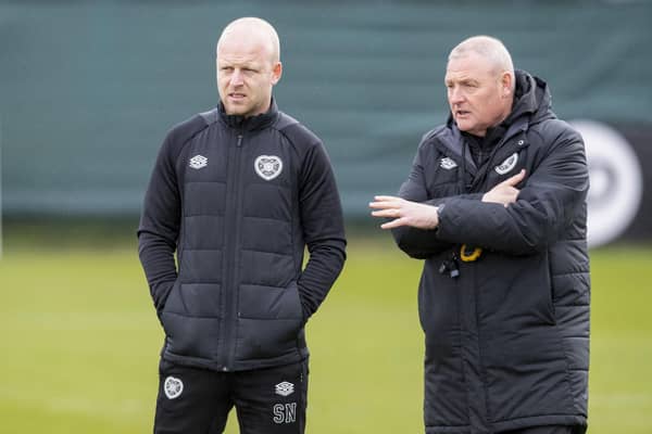 Steven Naismith and Frankie McAvoy oversee a Hearts training session.
