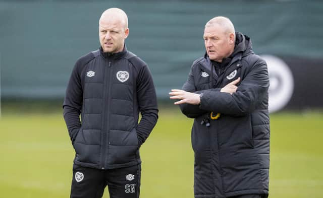 Steven Naismith and Frankie McAvoy oversee a Hearts training session.