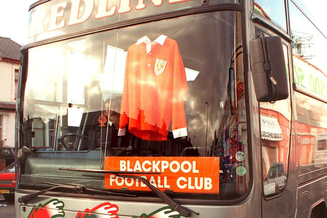 A bus travelled down from Blackpool. A shirt signed by Sir Stanley Matthews hung on the front of the coach.