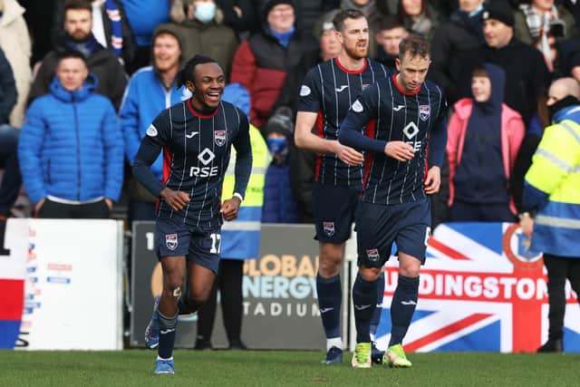 Ross County's Regan Charles Cook (left) celebrates after scoring in the 3-3 draw with Rangers (Photo by Craig Williamson / SNS Group)