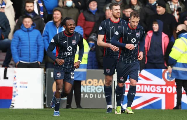 Ross County's Regan Charles Cook (left) celebrates after scoring in the 3-3 draw with Rangers (Photo by Craig Williamson / SNS Group)