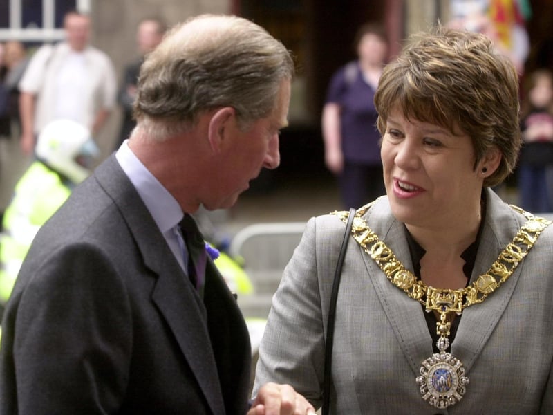 Prince Charles visits Gladstone's Land, on Edinburgh's Royal Mile, with Provost Leslie Hinds to mark Royal Tourism Day in 2012.