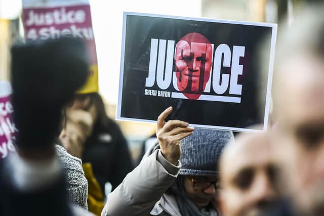 A vigil held by supporters of Sheku Bayoh outside the inquiry building. Picture Lisa Ferguson