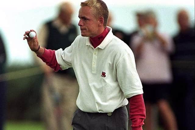 Luke Donald acknowledges the crowd during a winning Walker Cup appearance for Great Britain & Ireland at Nairn in 1999. Picture: Andrew Redington /Allsport