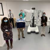 The surgical robot with NHS Tayside surgeons representing some of the cancer specialty areas